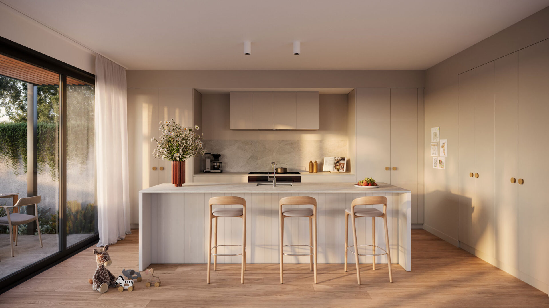 Soft light streams through the the contemporary family kitchen area with floor to ceiling windows and soft linen curtains.