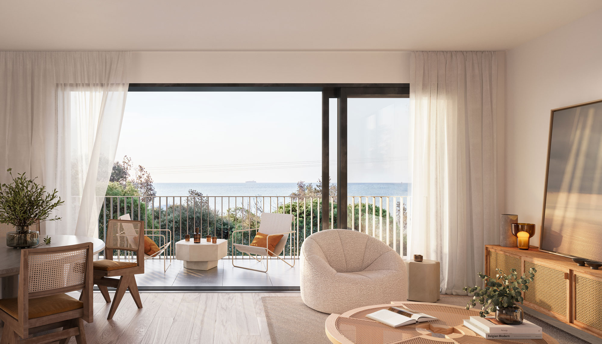 Soft light stream through the the contemporary lounge room, over looking ocean views.