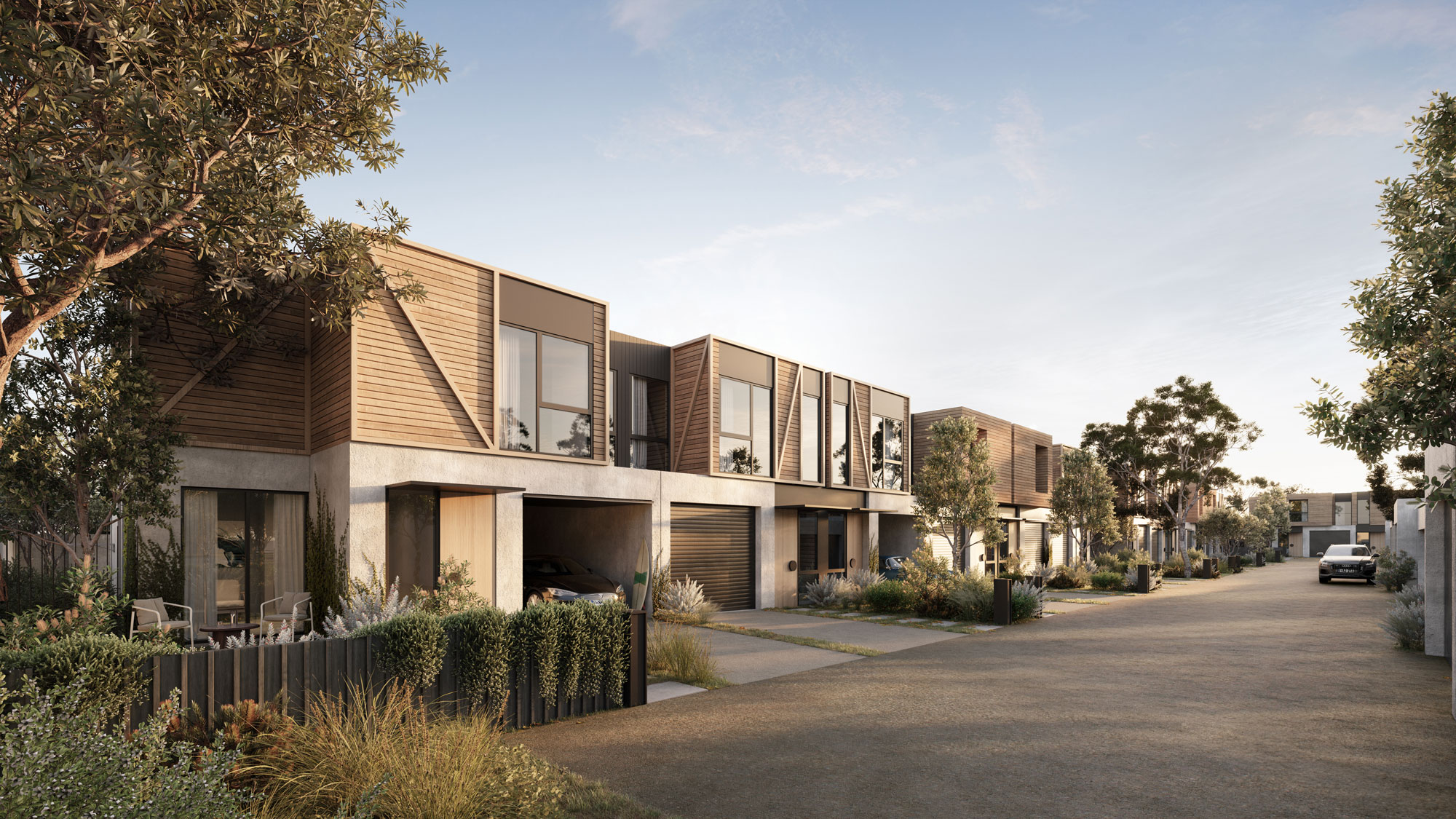 Timber clad townhouses surrounded by Lush landscaping.