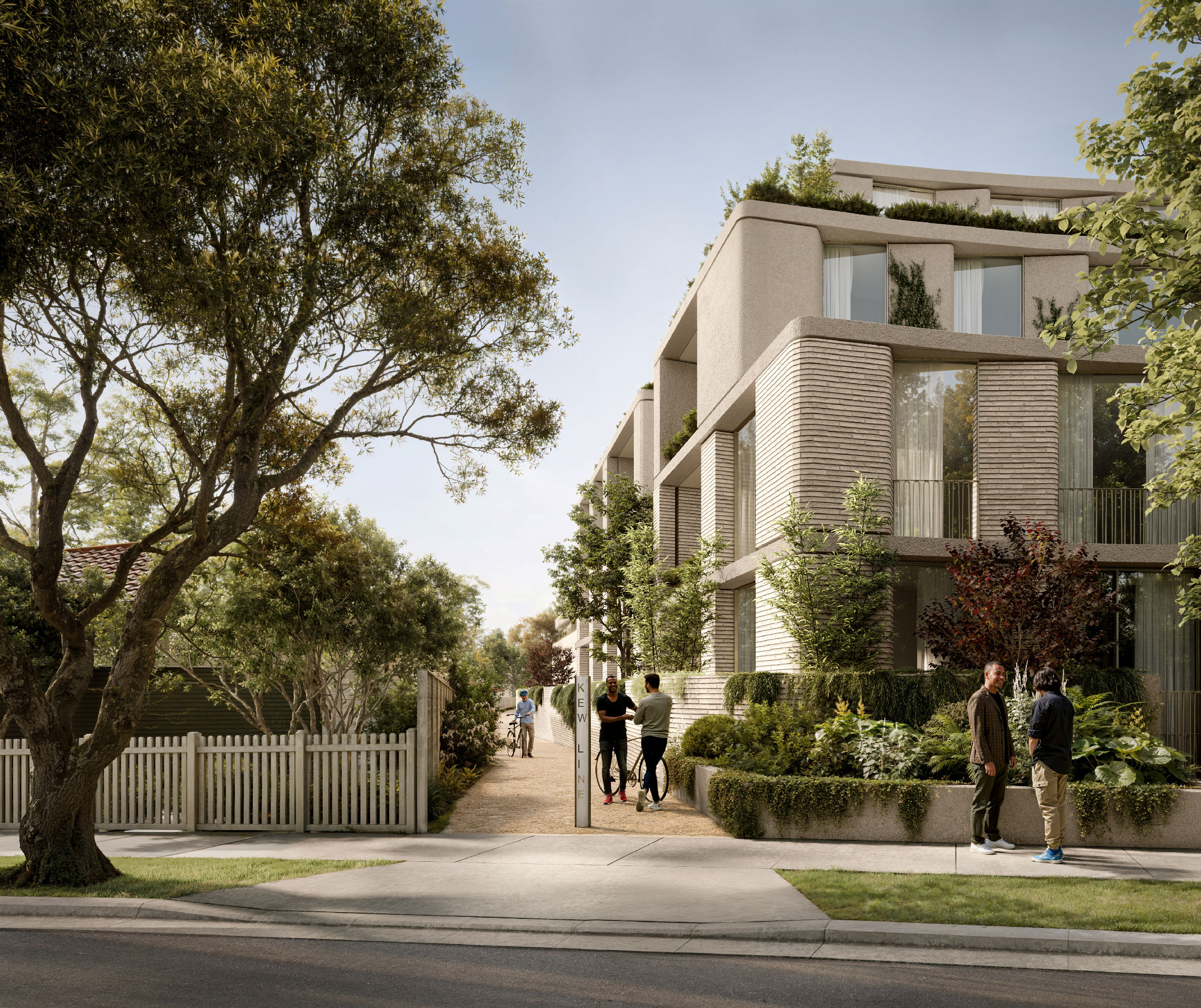 Pedestrian pathway entry at 138 Barkers Road marked by a timber Kew Line sign, flanked by mature trees and garden planting alongside the building façade.