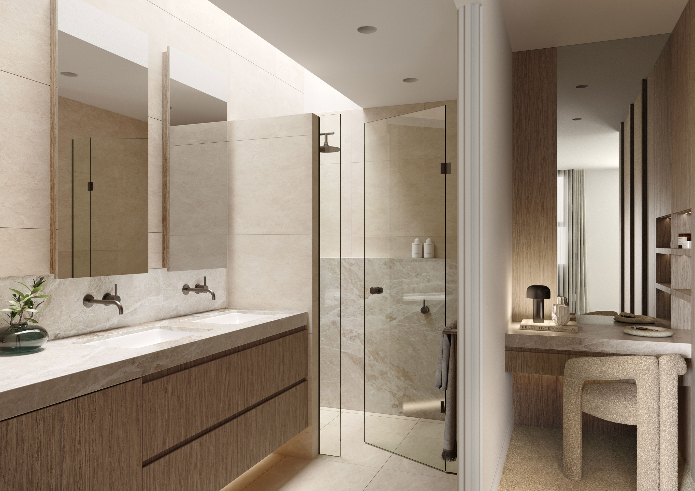 A bathroom in soft stone with double vanity, gunmetal tapware, frameless walk-in shower and an adjacent timber-lined dressing nook.